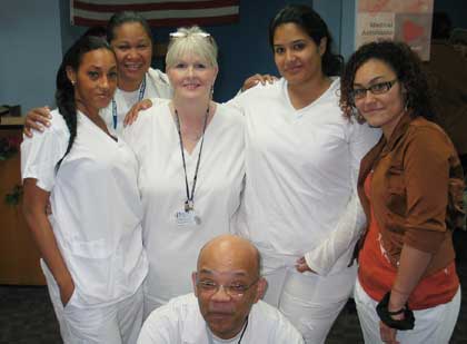 O. Johnson (3rd from l.) and Marina Marte (4th from the l.)  