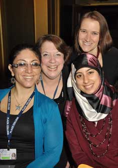 Asmaa Abbas (Front r.) poses with (l. to r., clockwise) Professor Melissa Tortora, Dean Lin Loffert, and Professor Laura Butchy. 
